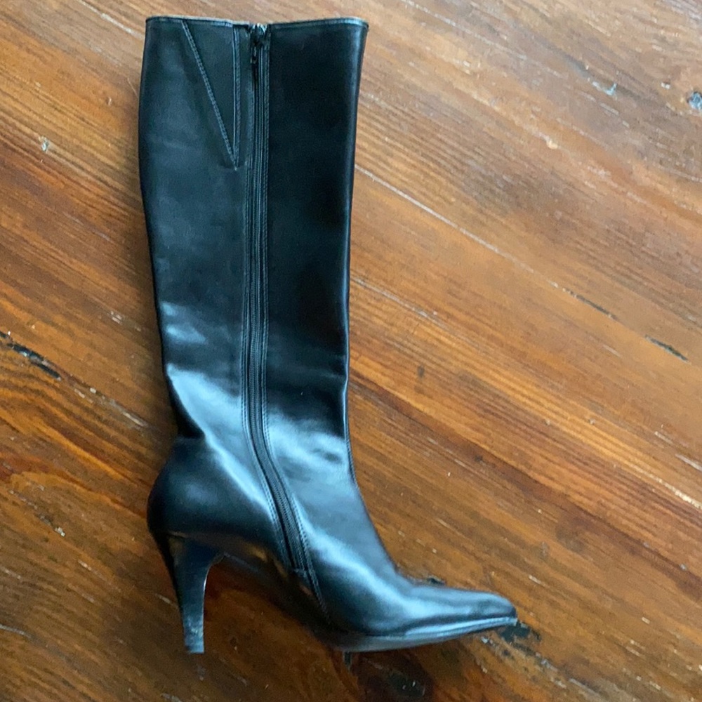 Leather, just below the knee high boots